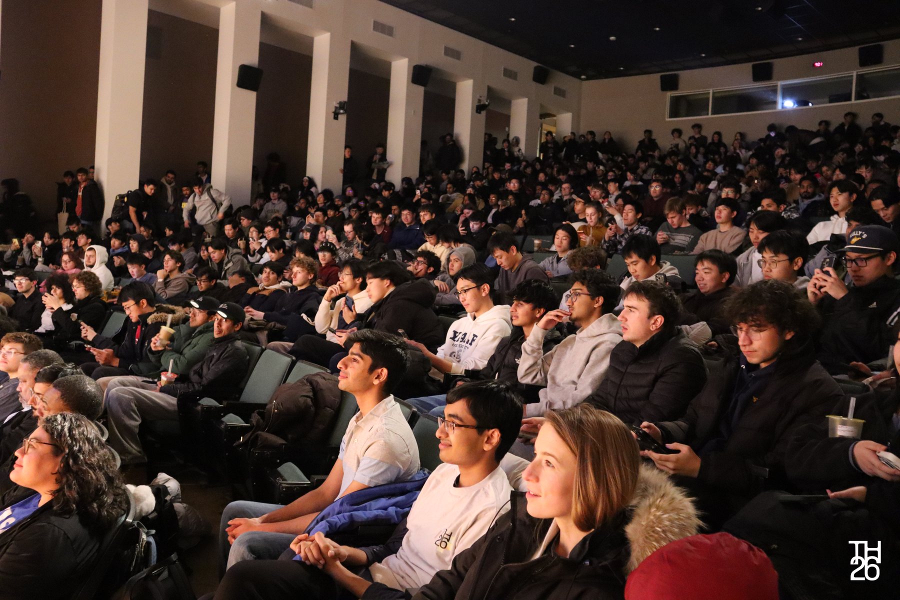 A packed lecture hall of students watching a ScottyLabs event, photographed at TartanHacks.